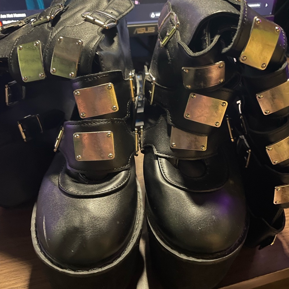 Size 8 black 3” Platform boots, Mid-calf length, with silver buckles.
